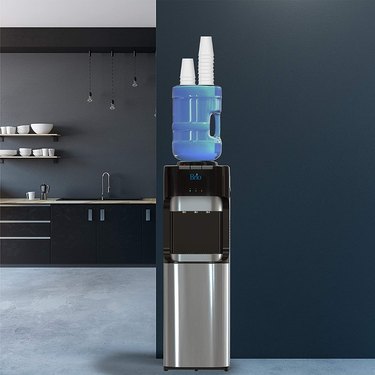Top Loading Water Cooler Dispenser in Kitchen