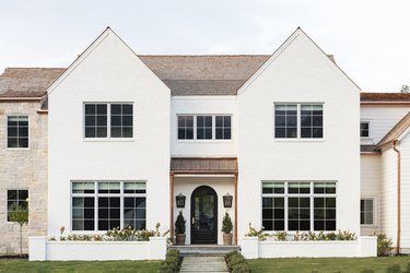 All white tudor-style home