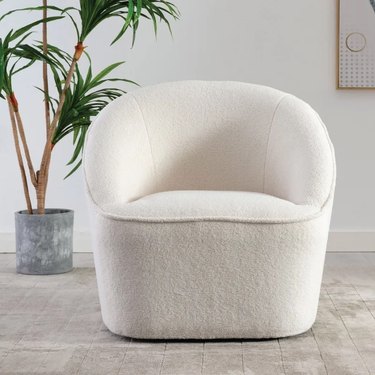 Swivel barrel chair in white