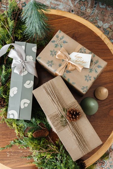 Three wrapped winter holiday presents
