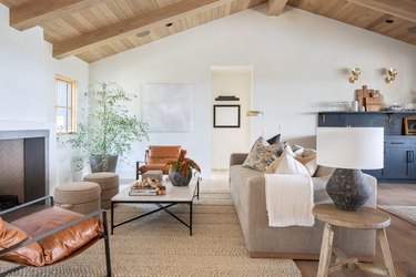 Modern farmhouse living room with a taupe sofa
