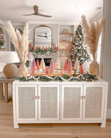 Boho Christmas decor with pink bottle-brush mini trees