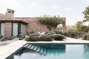 Brown brick house with swimming pool