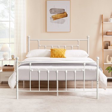 white metal farmhouse style bed