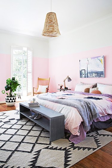 pink and white bedroom with pink sheets