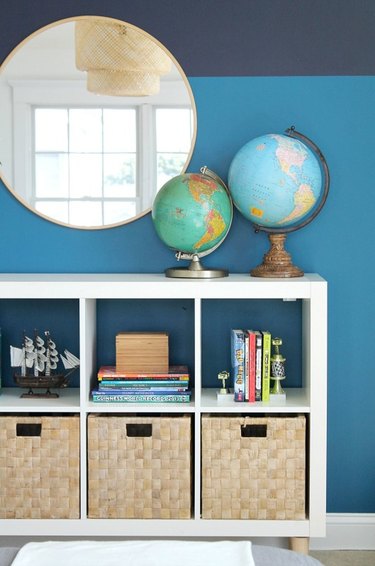 playroom with inky blue and turquoise walls