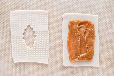 Spread pumpkin filling onto dough