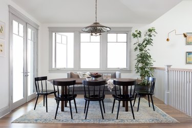 breakfast area with table and black chairs