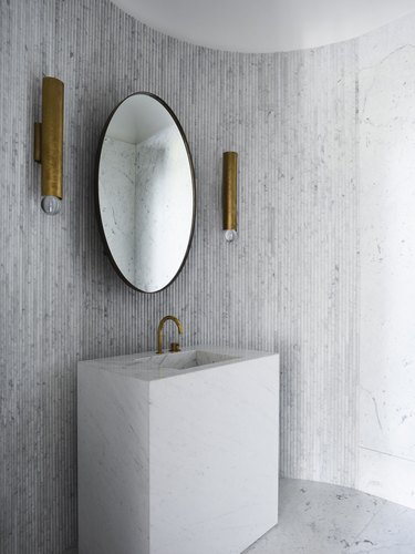 gray bathroom with linear marble tile