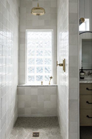 gray and white tiled shower