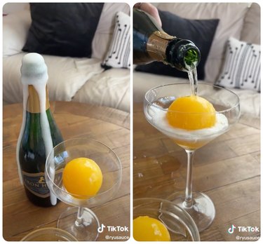mimosa hack: champagne with orange juice ice sphere
