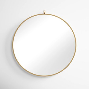 round bronze mirror