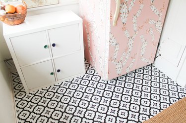 black and white tile in pink kitchen