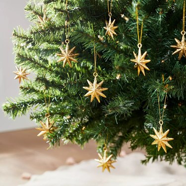 gold star ornaments on tree