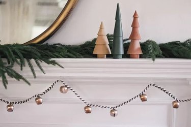 macrame holiday garland on a mantle