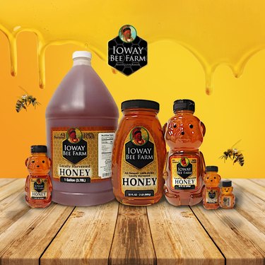 Various containers of honey on a yellow background.