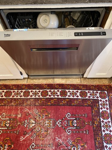 An open Beko dishwasher