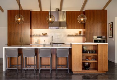 Modern kitchen with walnut cabinets