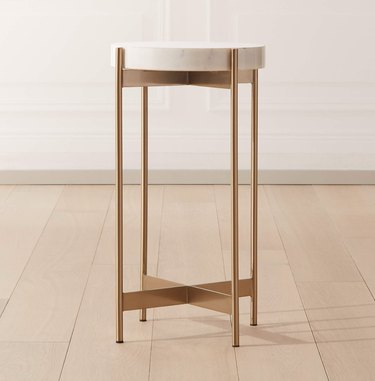 Marble topped end table with metal legs.
