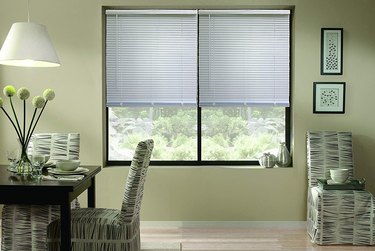 Modern dining room with cordless aluminum miniblind window treatment