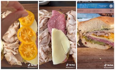 A hand placing sliced yellow tomatoes on a sandwich with turkey and provolone. In the middle is a close up of a sandwich topped with turkey, salami, and provolone. On the left is an Italian sandwich on a wooden cutting board.