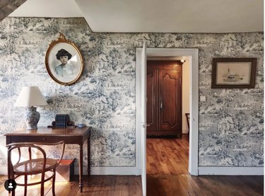 old world workspace with navy toile wallpaper