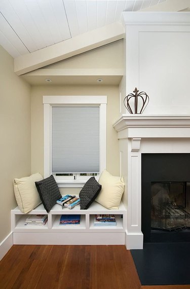 White self-adhesive blinds over a reading nook in a living area
