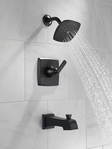 Black shower trim kit that's actively running water