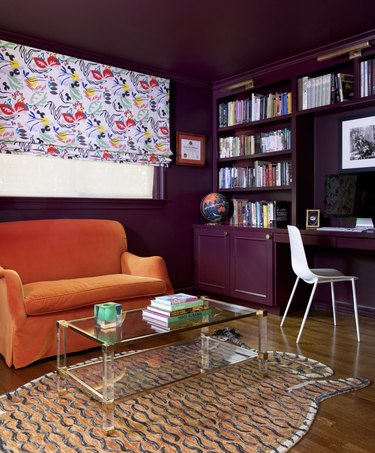 Orange and purple office space living room