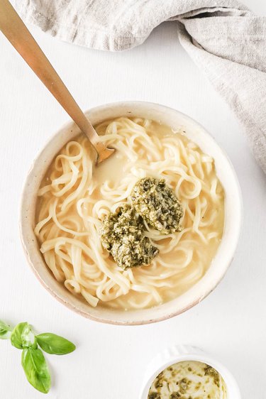 Creamy ramen and pesto in a bowl