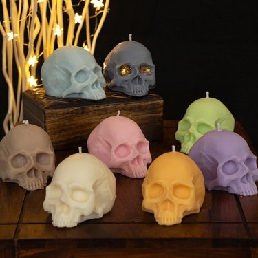 skull candles in rainbow colors