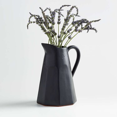 black pitcher with dried florals