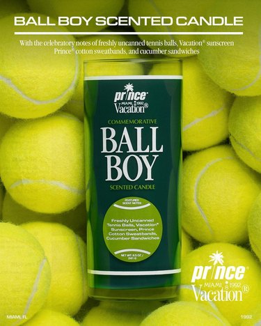 A "Ball Boy" candle on a bed of tennis balls