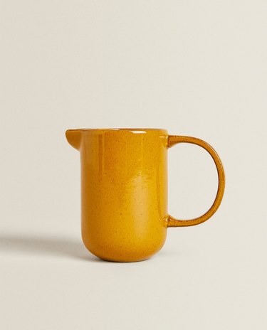mustard-colored milk pitcher
