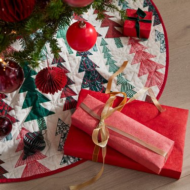 festive tree skirt with presents