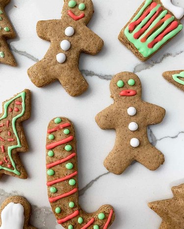 gingerbread cookies decorated with blue and red icing