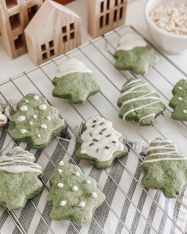 green sugar cookies cut like christmas trees