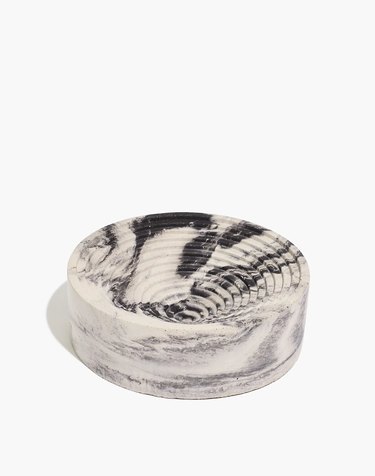 white and black marble bowl