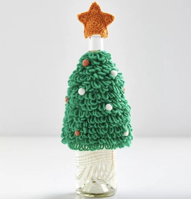 Urban Outfitters Festive Bottle Cover Set, $12