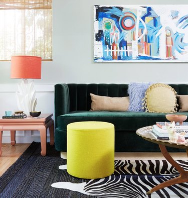 jewel-tone living room with hunter green sofa