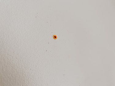 Install wall anchors in the drywall.