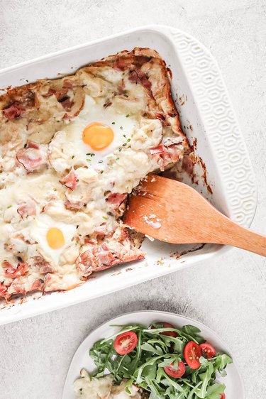 Croque madame casserole with a side salad