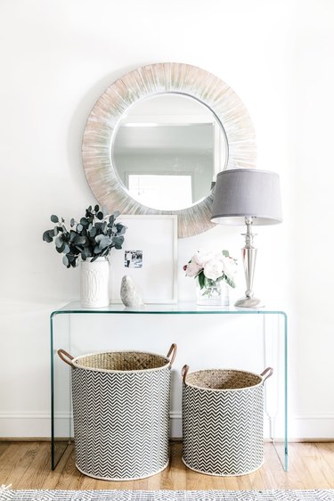acrylic table and mirror in entryway