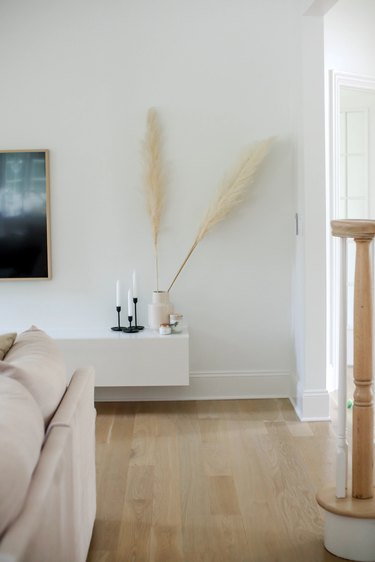 white minimalist living room with pampas grass