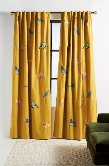 Gold curtains with embroidered birds