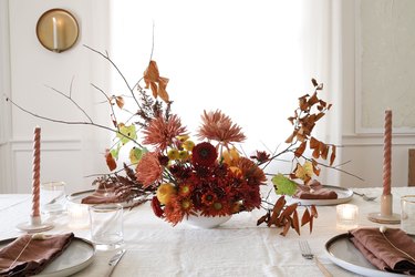 Thanksgiving holiday centerpiece with lemons and muted florals
