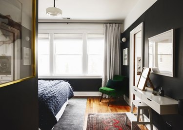 black vintage bedroom with retro light fixtures