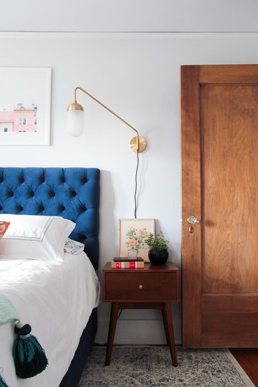 vintage bedroom with blue headboard