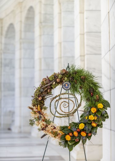 wreath near marble building