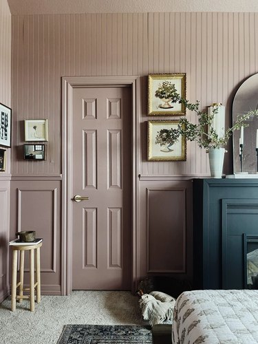 pink vintage bedroom with floral artwork